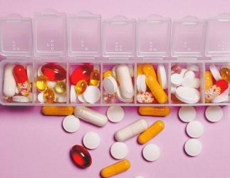 Container filled with a series of prescription drugs.