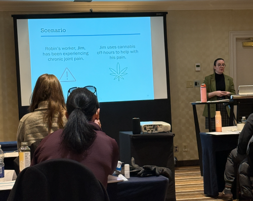 Woman gives presentation at workshop