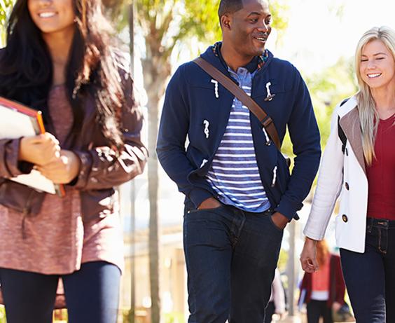 Students walking together on campus.