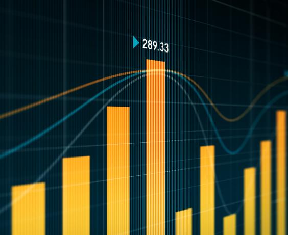 Bar chart with curved data lines over a grid.